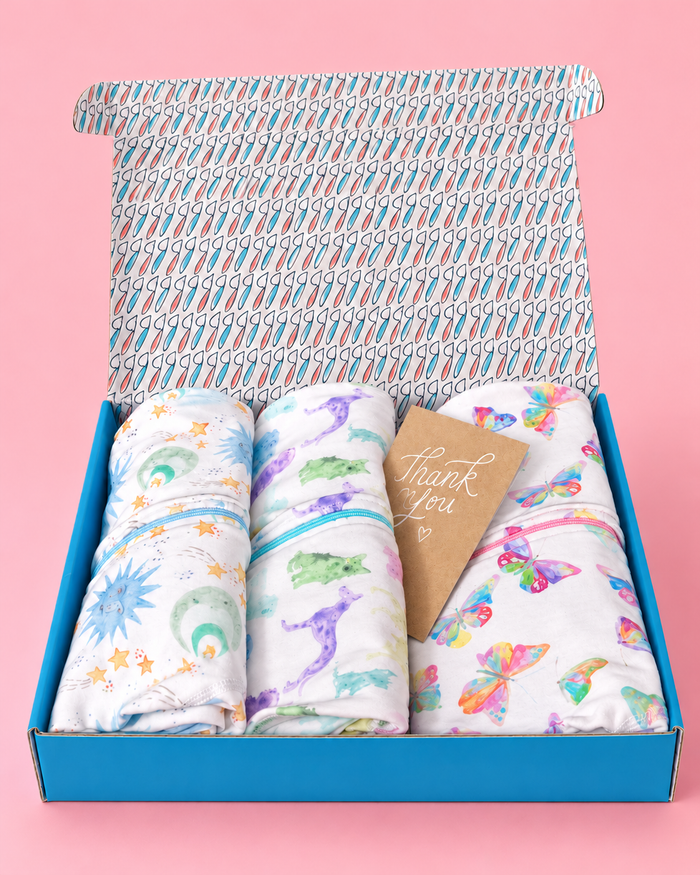 Three organic cotton jumpers with included gift packaging and a thank-you card